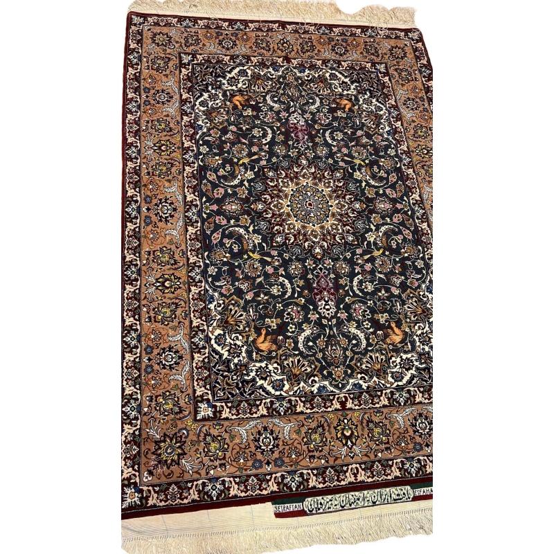 "Elegant Seirafian rug with a detailed floral pattern, showcasing traditional Persian weaving techniques."