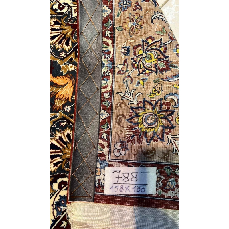 "Backside of a hand-knotted Seirafian Persian rug, revealing the intricate silk warp and craftsmanship by Master Hassan Seirafian."