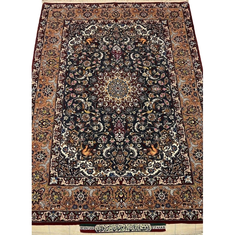 "Hand-knotted Hassan Seirafian Persian rug with silk and wool blend, featuring intricate floral and medallion design."