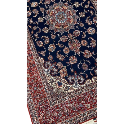 "Close-up of Seirafian Persian rug detailing luxurious handwoven craftsmanship."