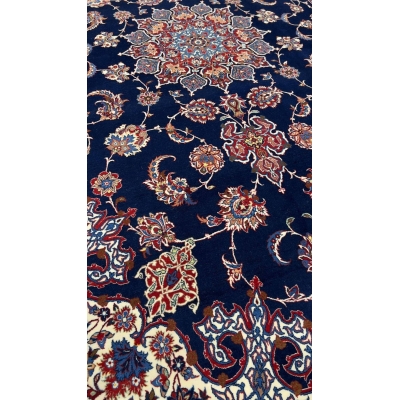 "Hand-knotted wool and silk Seirafian Persian rug showcasing intricate floral motifs."