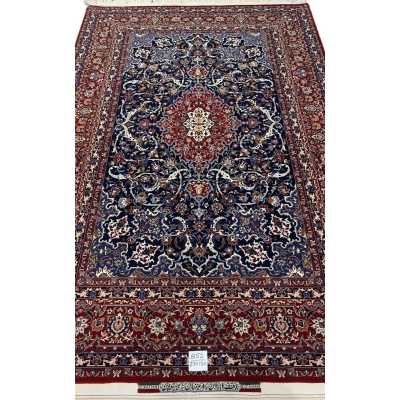 "Hand-knotted Isfahan rug by Master Bagher Seirafian with intricate floral and medallion patterns."