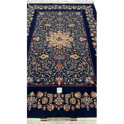 "Hand-knotted Isfahan Persian rug in navy blue with silk and wool pile."