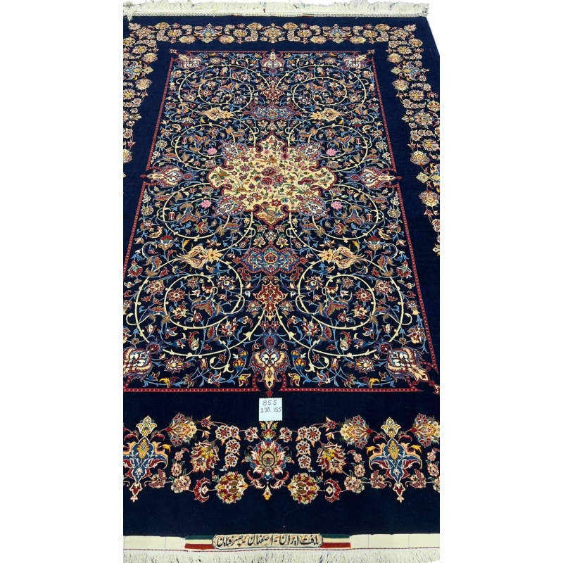 "Hand-knotted Isfahan Persian rug in navy blue with silk and wool pile."