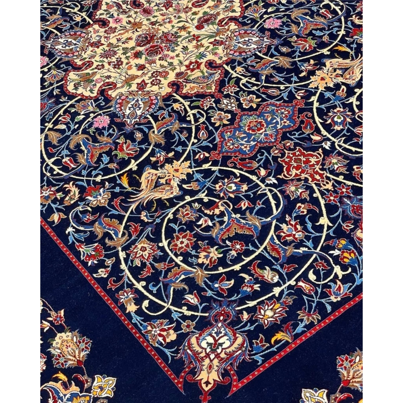 "Isfahan rug with navy blue base and vibrant floral medallion by Bagher Seirafian."