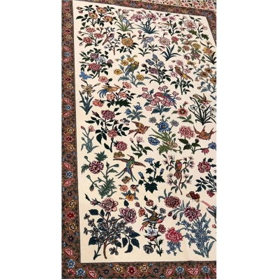 Close-up of wool and silk floral pattern on Seirafian Persian rug