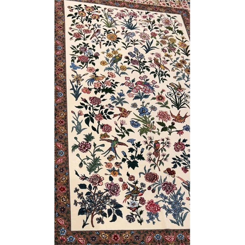 Close-up of wool and silk floral pattern on Seirafian Persian rug
