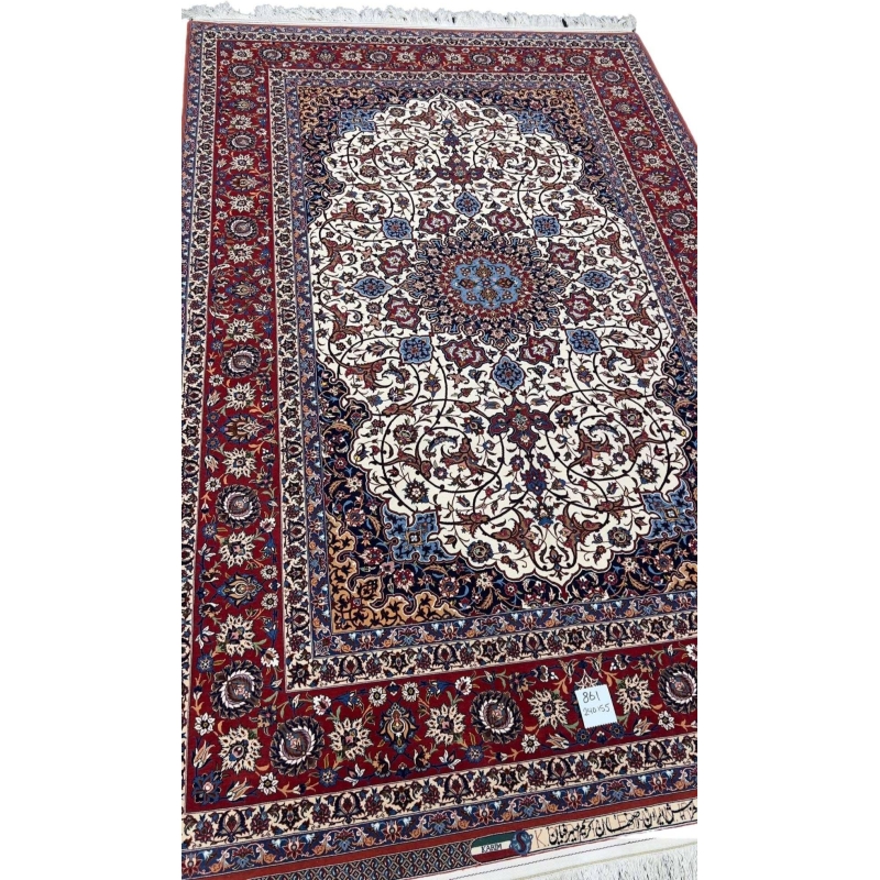 A detailed side view of the Genuine 5 x 7 Red and Beige Seirafian Persian rug, showcasing its intricate hand-knotted texture, luxurious wool and silk pile, and fine craftsmanship by Grand Master Karim Seirafian.