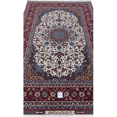 An elegant hand-knotted 5 x 7 red and beige Seirafian Persian rug from Isfahan, crafted by Grand Master Karim Seirafian with intricate patterns and rich detailing.