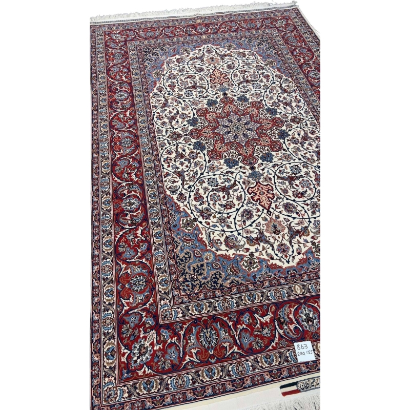 "Close-up of intricate floral motifs on a wool and silk Persian rug with a high knot density of 1,440,000 knots/m²."