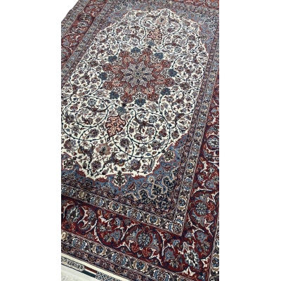 "Luxurious Persian rug featuring a star medallion and detailed floral patterns, hand-knotted in Isfahan, Iran."