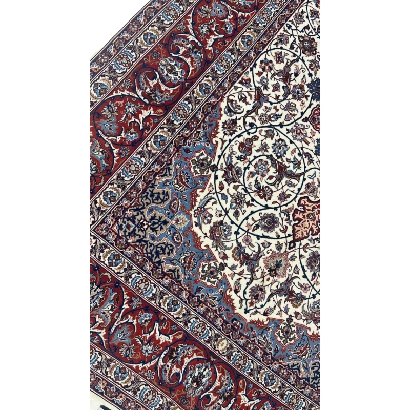 "Isfahan rug with cream background, red and blue accents, and silk warp by Master Bagher Seirafian."