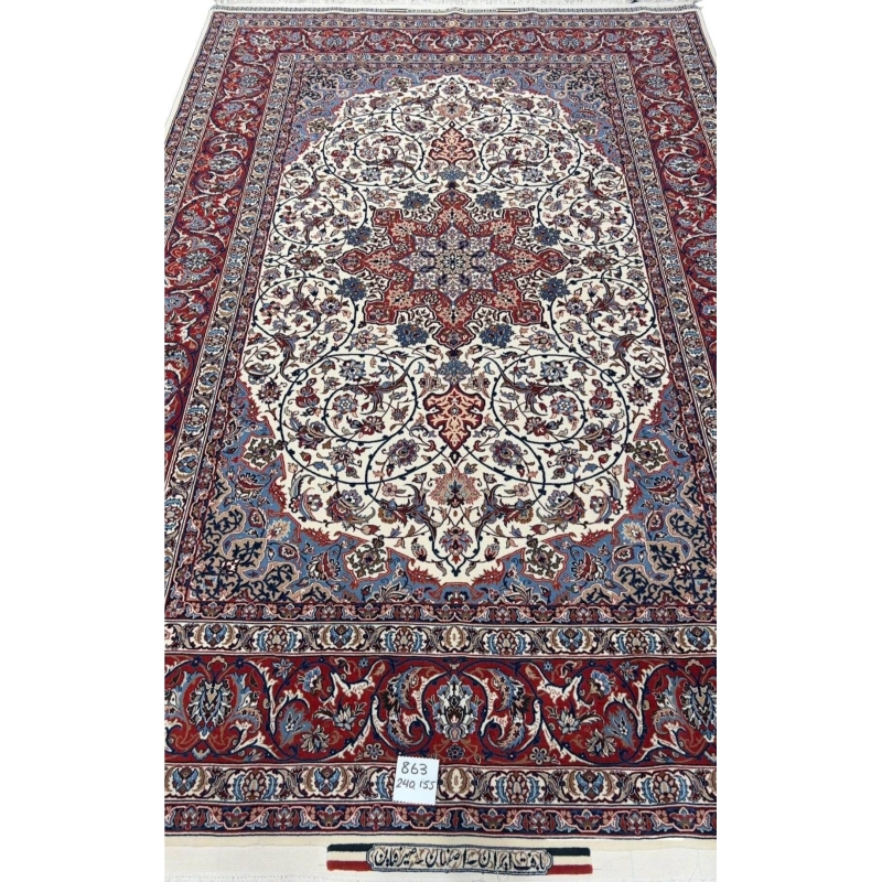 "Hand-knotted Isfahan rug with star medallion design in cream, red, and blue, crafted by Master Bagher Seirafian."
