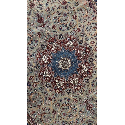 "Close-up of intricate Persian rug weaving by Seirafian masters"