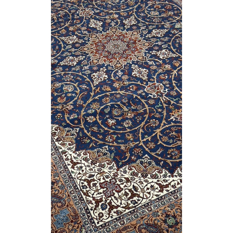 "Luxurious Persian rug showcasing a central medallion design in deep blue, ivory, and gold tones."