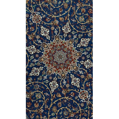 "Close-up of intricate paisley and floral motifs on a silk and wool Persian rug."