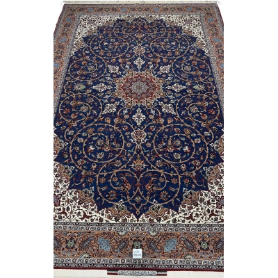 "Hand-knotted Isfahan rug by Hassan Seirafian featuring a navy blue field with floral patterns."