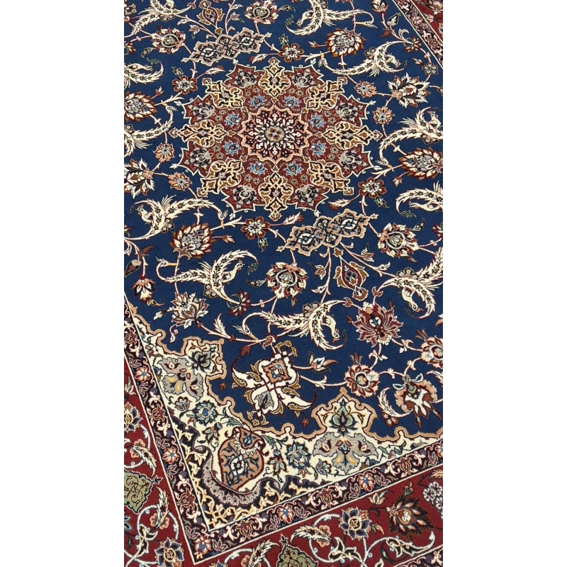 High-quality Seirafian carpet in bold blue and red tones for elegant decor.