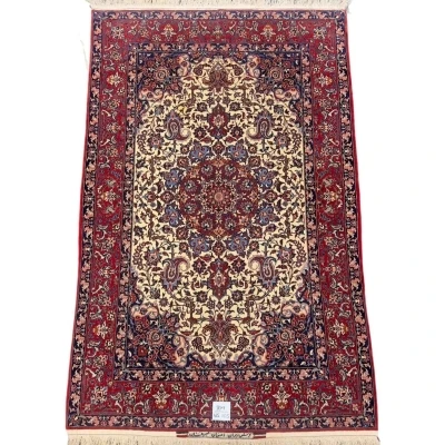 Decorative Seirafian rug, handwoven with natural dyes and silk accents.
