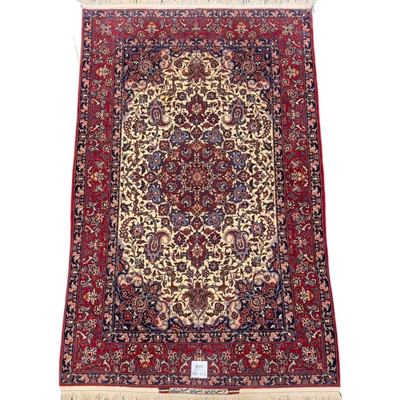 Decorative Seirafian rug, handwoven with natural dyes and silk accents.