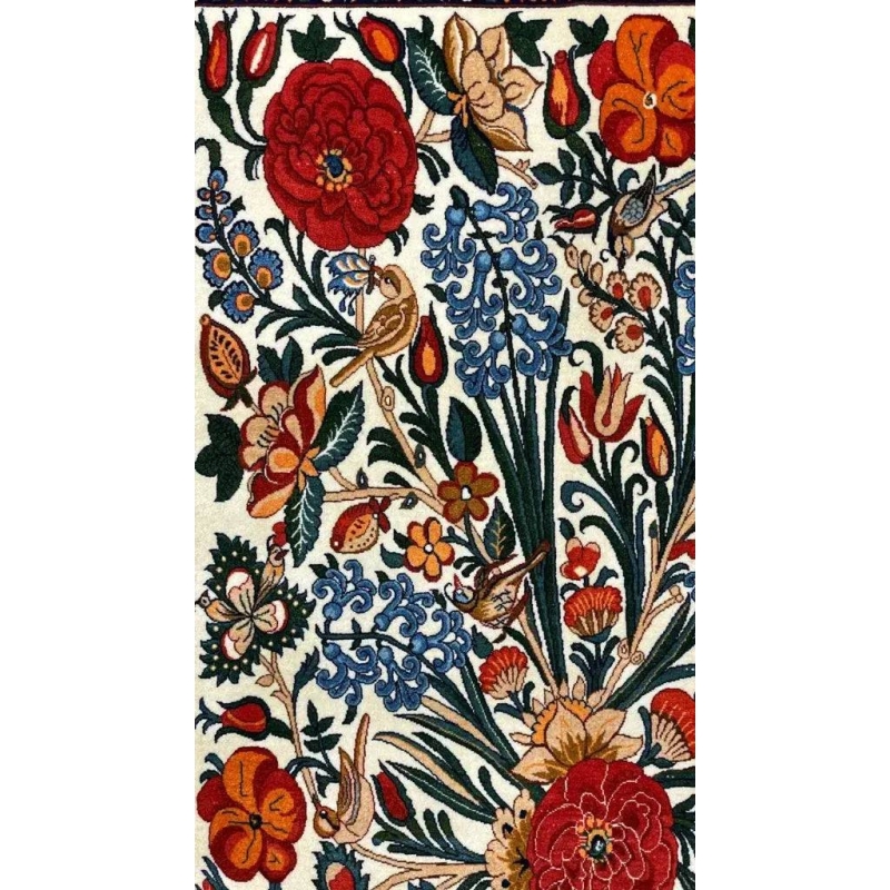 Bright and colorful floral rug by Seirafian, crafted with natural materials.