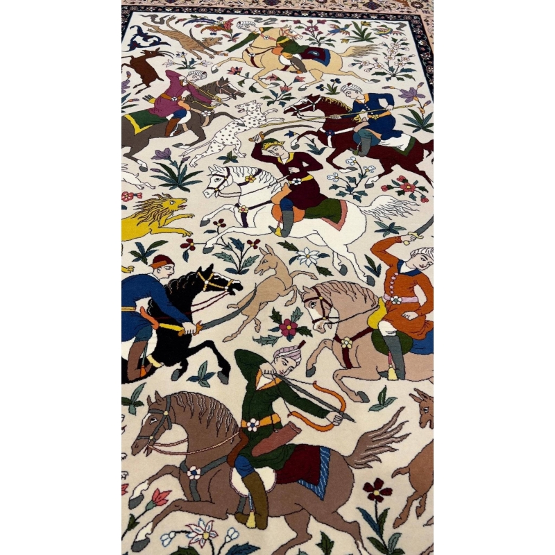 Collectible Isfahan rug by Hassan Seirafian with hunting scene and natural colors.