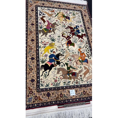 Seirafian rug from Isfahan with a silk foundation and lifelike hunting designs.