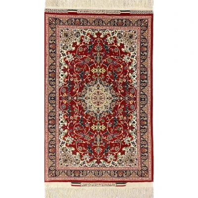 Elegant Seirafian Isfahan rug in red, cream, and navy with intricate medallion design.
