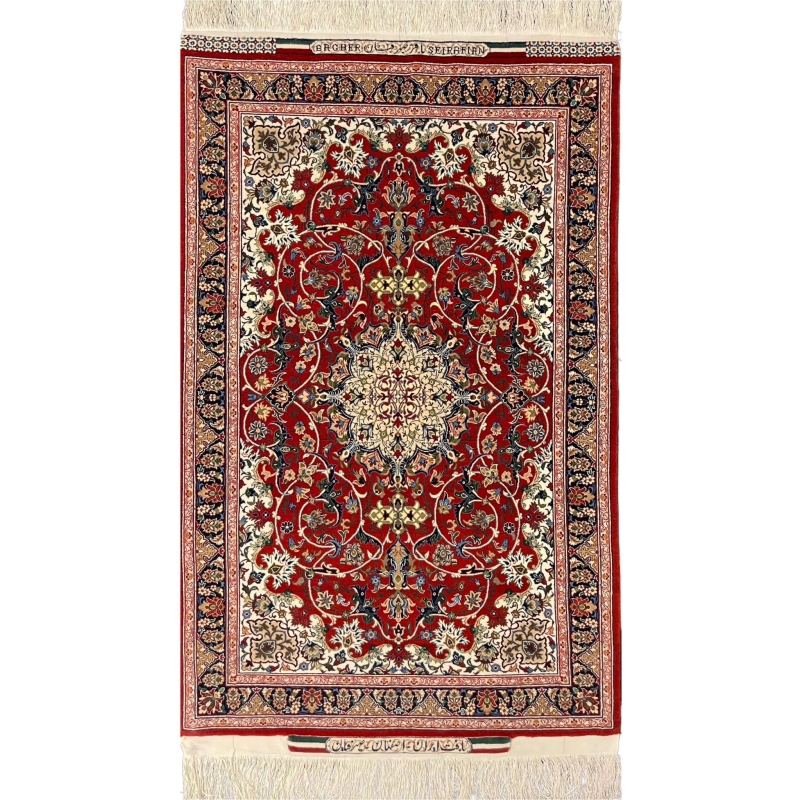 Elegant Seirafian Isfahan rug in red, cream, and navy with intricate medallion design.