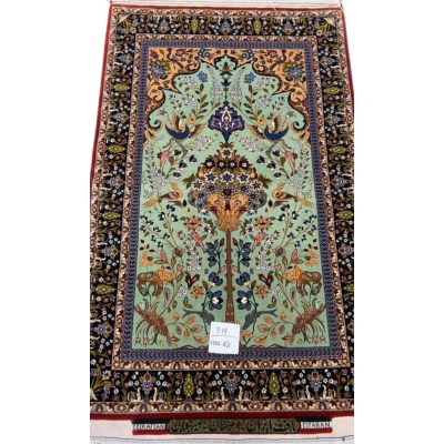 Hand-knotted Persian rug by Seirafian featuring a "Tree of Life" design on a turquoise background.
