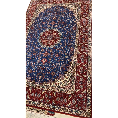 "50-year-old Seirafian Persian rug with natural dyes, crafted in Isfahan with traditional techniques."