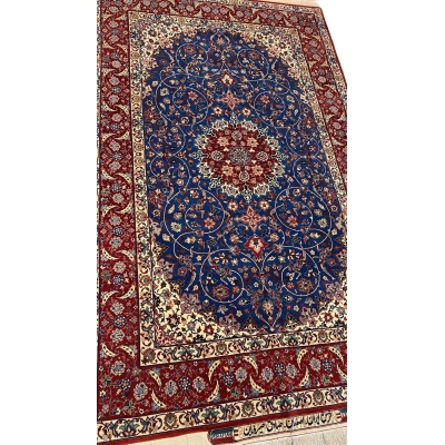 "Hand-knotted wool and silk Persian rug from Sadegh Seirafian, showcasing intricate floral patterns."