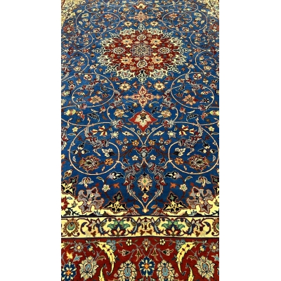 "Close-up of intricate knotting and floral patterns on a Sadegh Seirafian vintage Persian rug, highlighting wool and silk details."