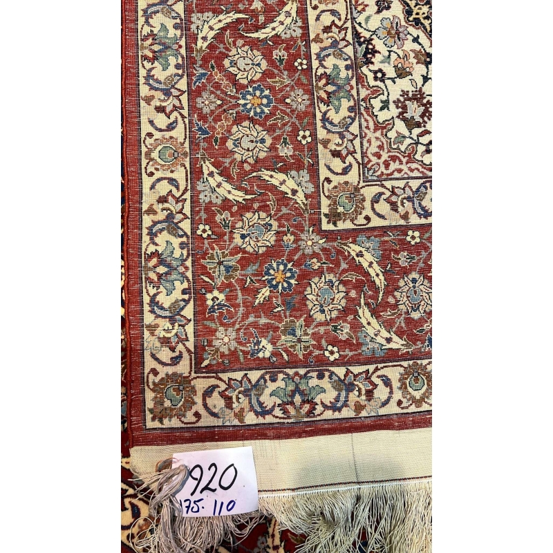 "Backside of the vintage Sadegh Seirafian Persian rug, revealing fine hand-knotted craftsmanship with silk warp."