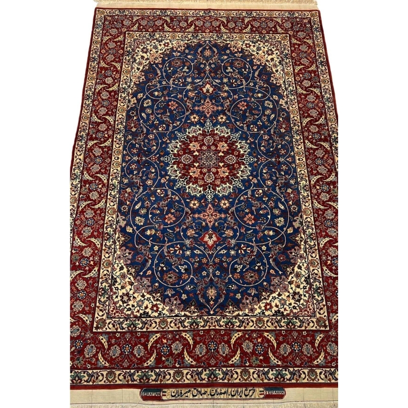"Vintage hand-knotted Persian rug by Sadegh Seirafian, featuring intricate designs in wool and silk."