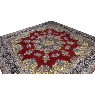 "Large Isfahan rug with striking red and gold color palette, perfect for elegant interiors."