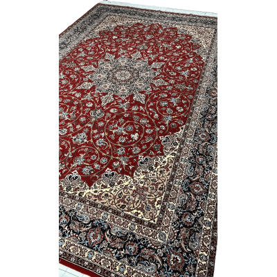 "320 x 215 cm Persian rug from Isfahan, knotted by hand with silk warp and a fine wool-silk pile, crafted by renowned weaver Bagher Seirafian."