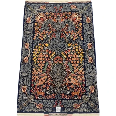 Hand-knotted Seirafian rug featuring deer, florals, and birds in a vibrant design.
