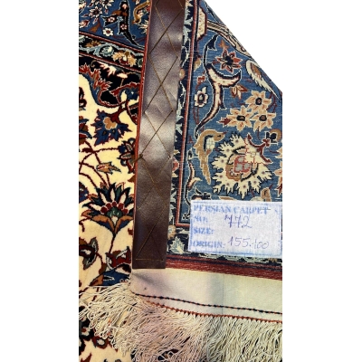 "Backside of a hand-knotted Seirafian Persian rug, revealing the intricate silk warp and craftsmanship by Master Ahmad Seirafian."