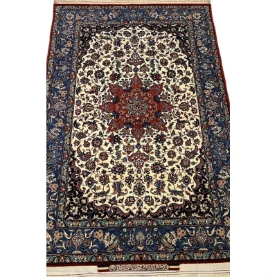 "Intricately handwoven Seirafian Persian rug with wool and silk blend, featuring a stunning medallion design."

