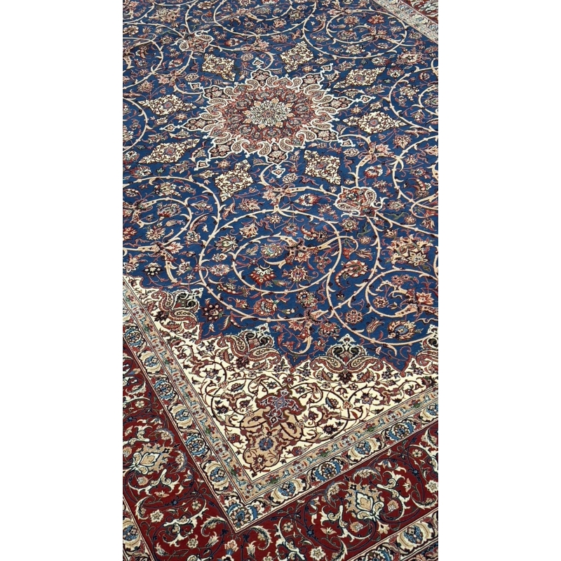 "Exquisite Persian rug featuring floral motifs and paisley patterns in rich navy, red, and ivory."
