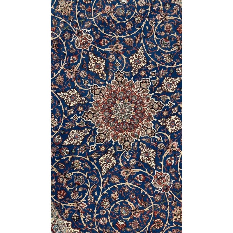 "Close-up of the intricate medallion design on a handwoven silk and wool Persian rug."