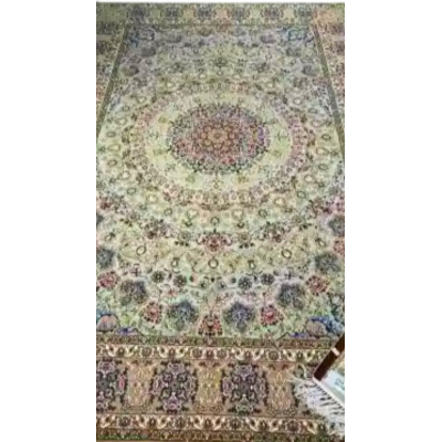 Hand-knotted Isfahan rug with a silk and wool blend, featuring an intricate medallion design and soft pastel hues.