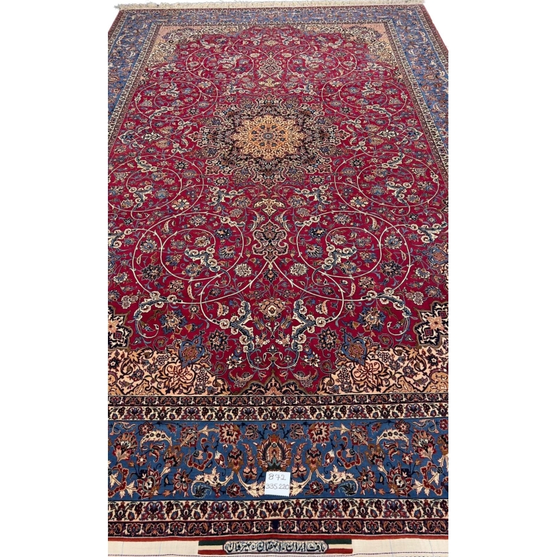 Luxury Semi-Antique Isfahan Carpet – Exquisite Persian rug woven by Grand Master Ahmad Seirafian, showcasing a stunning floral medallion with 1,210,000 knots/m², made from fine silk and wool blend.