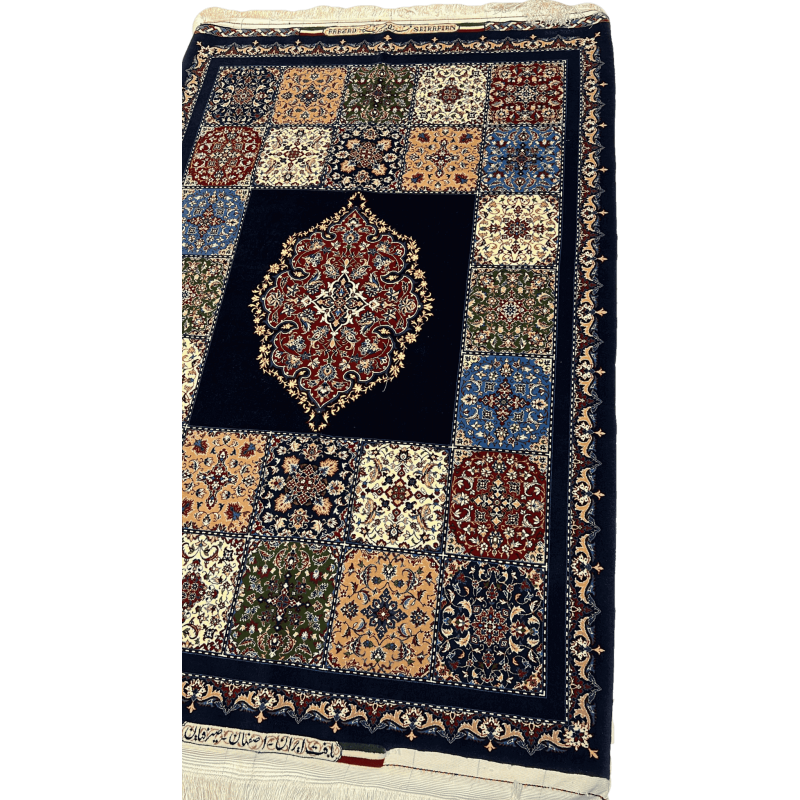 "Angled view of a hand-knotted Farzad Seirafian Persian rug showcasing the detailed mosaic pattern and medallion in rich colors, made from silk and wool."