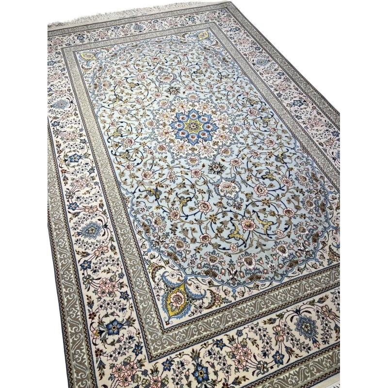 Persian rug featuring a central medallion design and elegant floral motifs.