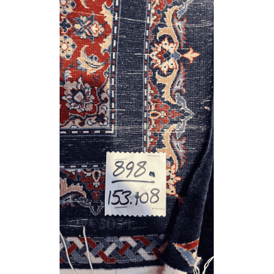 "Backside of a Farzad Seirafian Persian rug, displaying the fine knot structure and craftsmanship, handwoven in Isfahan with silk warp and wool pile."