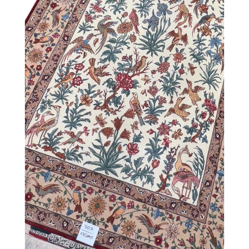 Exquisite Isfahan rug with a delicate floral and avian design, woven on a silk warp for a timeless, elegant finish.