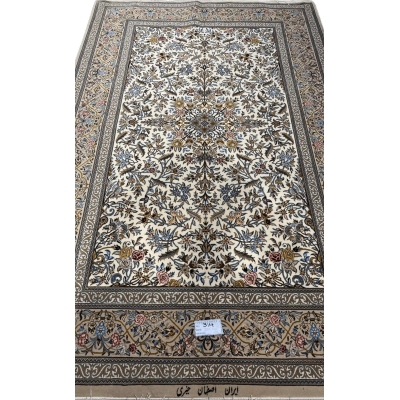 "Exquisite handwoven Isfahan Persian rug featuring intricate floral motifs, silk-wool blend, and a delicate ivory background."