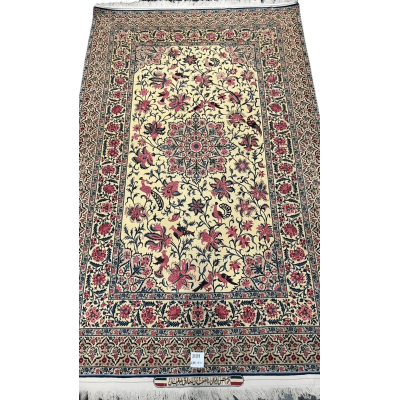 Wide-angle shot of a distinctive large rug by Sadegh Seirafian featuring floral artwork